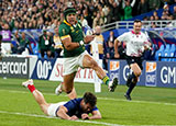 Cheslin Kolbe breaks away to score a try for South Africa against France in 2023 Rugby World Cup quarter final