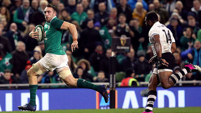 Jack Conan goes through to score Ireland's third try against Fiji