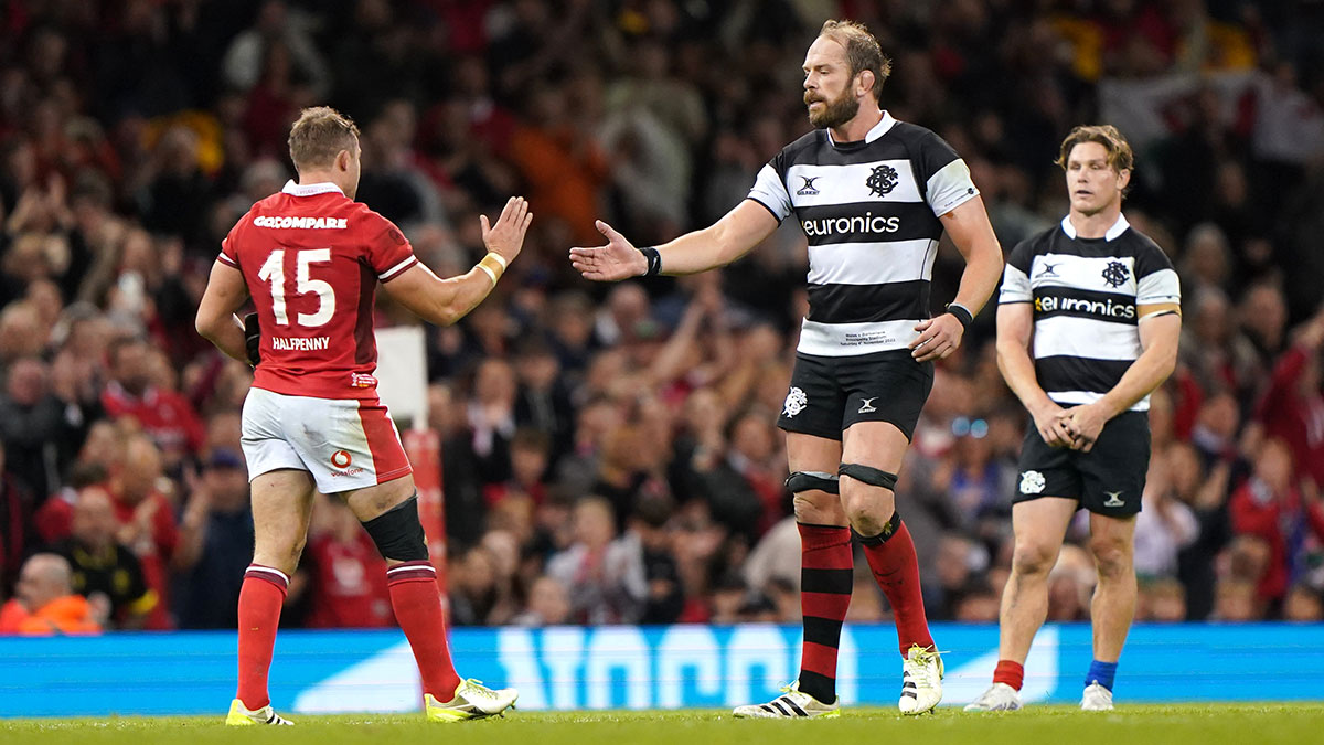 Alun Wyn Jones congratulates Leigh Halfpenny as he leaves the field in Wales v Barbarians match in autumn 2023