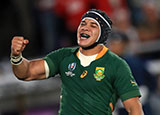 Cheslin Kolbe celebrates scoring a try for South Africa v England in World Cup final