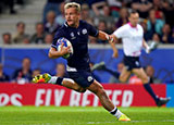 Darcy Graham runs through to score a try for Scotland v Romania in 2023 Rugby World Cup