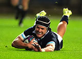 Darcy Graham slides in to score a try for Scotland v Fiji during 2024 Autumn Internationals