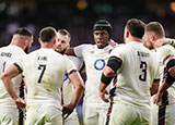 England players in huddle during 2025 Six Nations match against Scotland