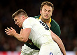 England's Owen Farrell tackles South Africa's Andre Esterhuizen