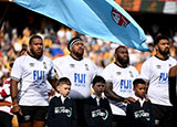 Fiji players sing anthem before match against Australia during 2025 summer