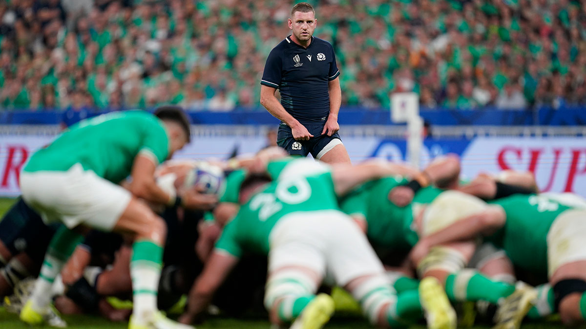 Finn Russell watches scrum during Ireland v Scotland match at 2023 Rugby World Cup