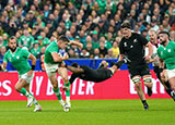 Garry Ringrose is tackled during Irelnd v New Zealand quarter final at 2023 Rugby World Cup