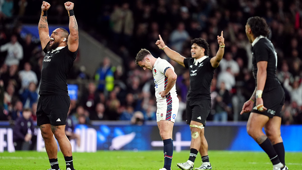 George Ford looks dejected as All Blacks celebrate after England v New Zealand match in 2024 autumn internationals