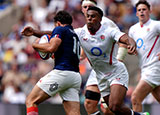 Immanuel Feyi-Waboso tackles Antoine Hastoy during the England XV v France XV match before 2025 Summer tour