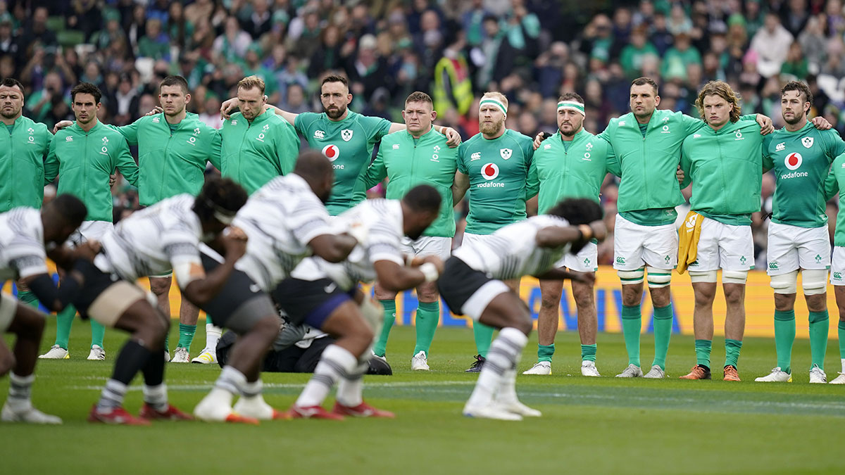 Ireland players watch as Fiji perform the Cibi during 2022 autumn internationals