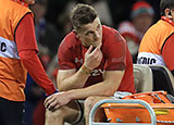 Jonathan Davies leaves the field injured during the Wales v Australia match