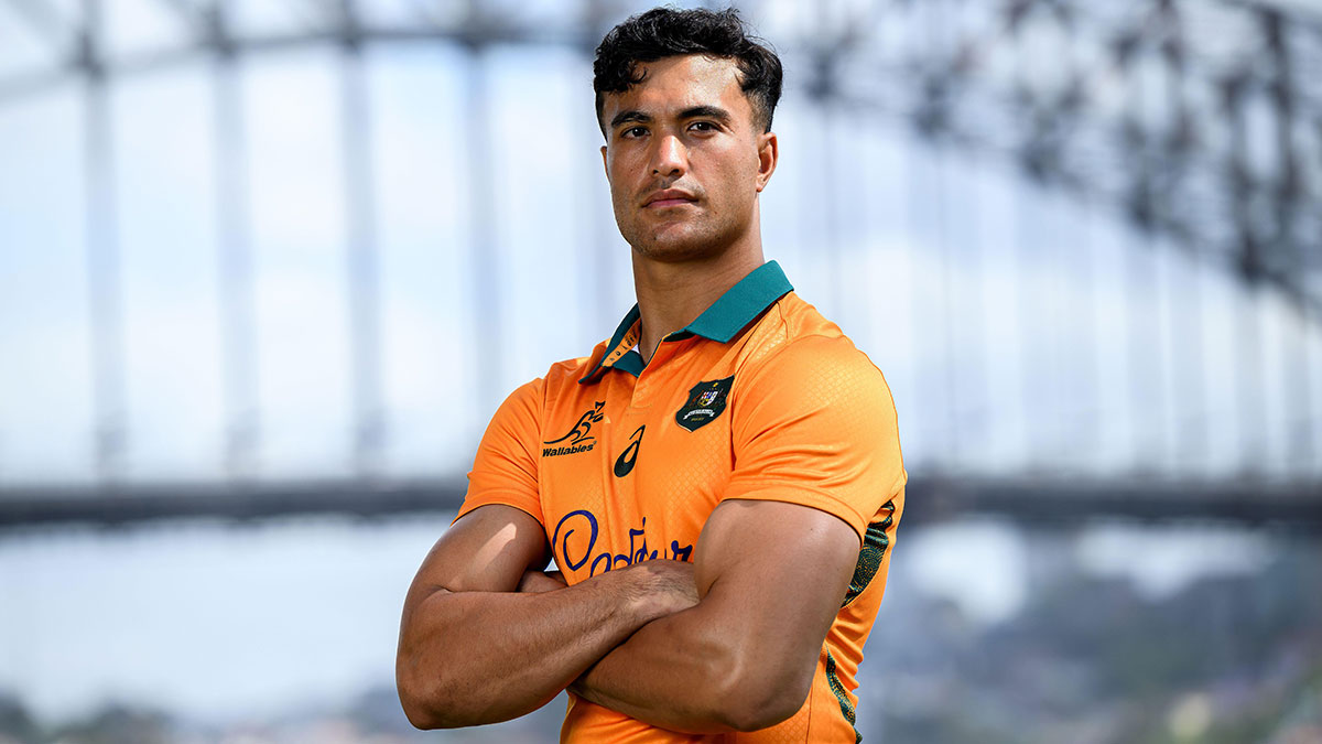 Joseph-Aukuso Suaalii poses in front of Sydney Harbour Bridge during Wallabies announcement