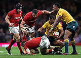 Kurtley Beale and Tevita Kuridrani tackle Wales' Steffan Evans