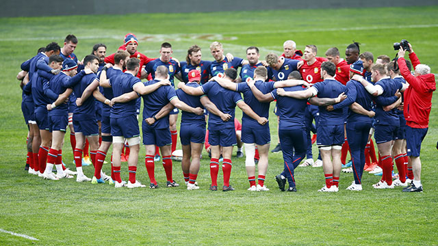 Lions gather around during training session