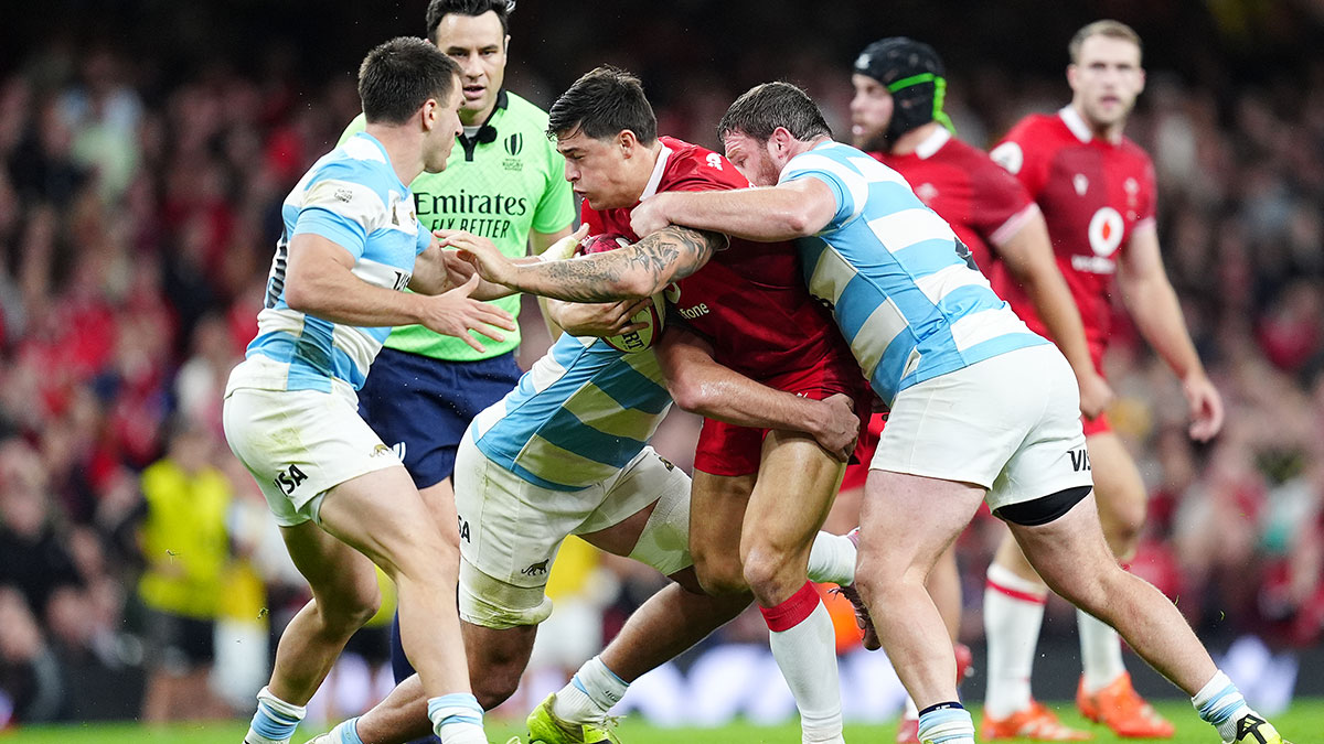 Louis Rees-Zammit is tackled in Wales v Argentina match during 2025 Autumn Internationals