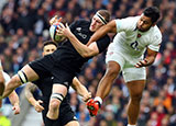 New Zealand's Brodie Retallick is challenged by England's Billy Vunipola at Twickenham in 2014