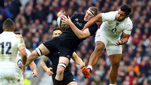 New Zealand's Brodie Retallick is challenged by England's Billy Vunipola at Twickenham in 2014