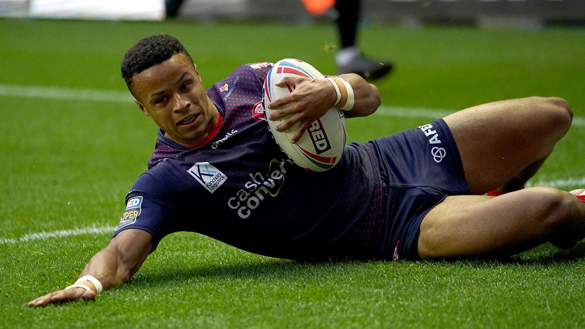 Regan Grace scores a try for St Helens whilst playing rugby league