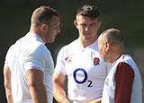 Sam Underhill, Tom Curry and head coach Eddie Jones during an England training session