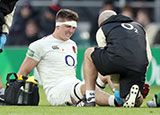 Tom Curry receives treatment during the England v South Africa match