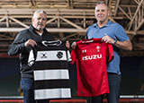 Warren Gatland and Wayne Pivac hold up Barbarians and Wales shirts